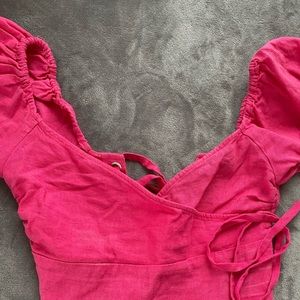 Pink linen top with a tied back